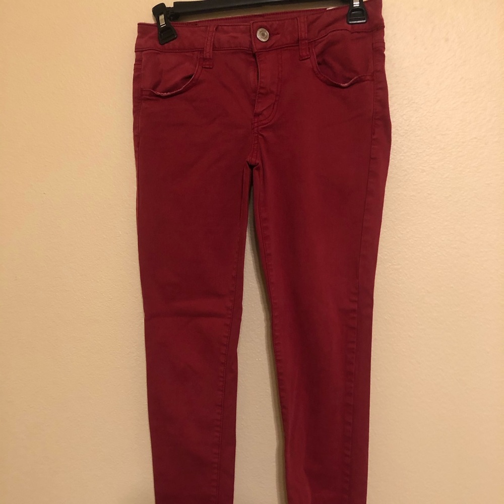 American Eagle red skinny jeans